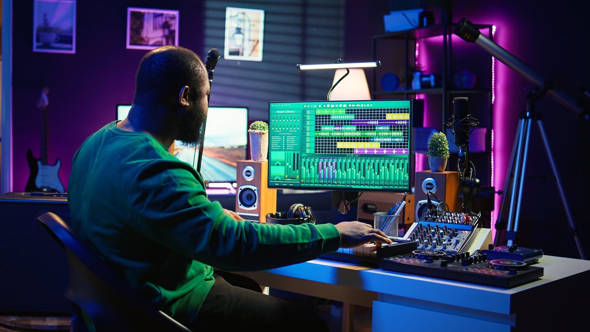 Neon Beams artist making music while wearing Neon Beams apparel